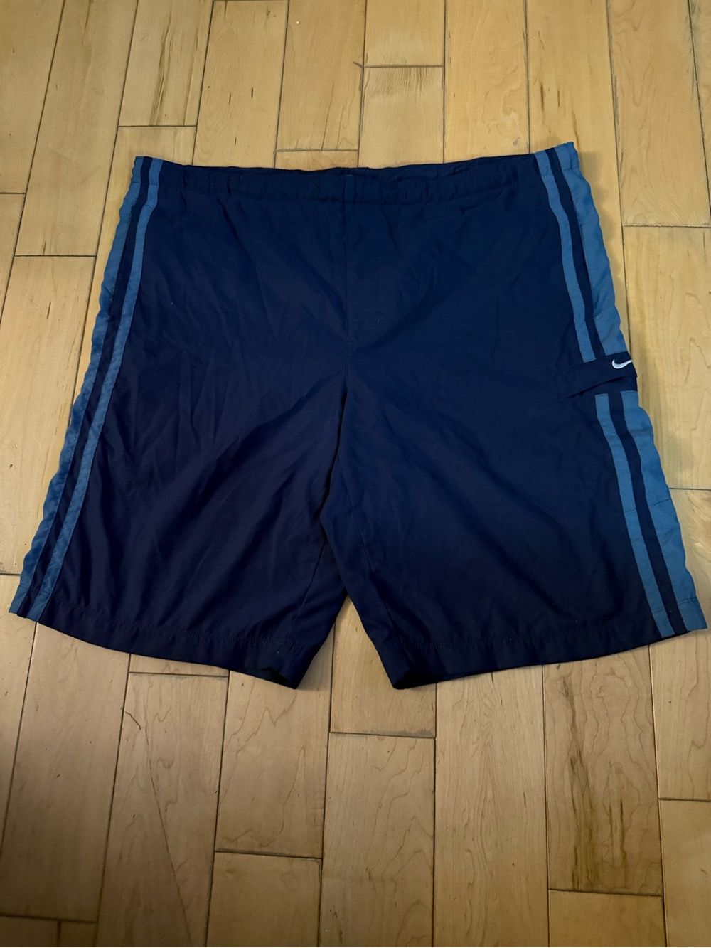 Nike Men's Dark Blue Swim Trunks with Light Blue Side Stripes